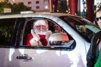 Santa Arrives in an Escalade to Holiday at The Park