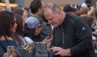 Coach Gallant Signs VGK Gear While Greeting Fans on the Red Carpet