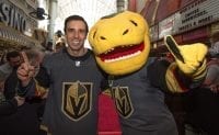 Goaltender Marc-André Fleury Poses with Team Mascot, Chance, While Celebrating at Fan Fest
