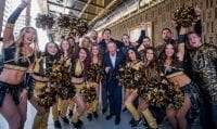 Team President Kerry Bubolz Poses with the Vegas Golden Knights Promo Team and Ice Crew at Fan Fest
