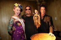 Vince Neil, Tana the Tattooed Lady, and Tony Felicetta celebrate Neil’s shrunken head at The Golden Tiki.