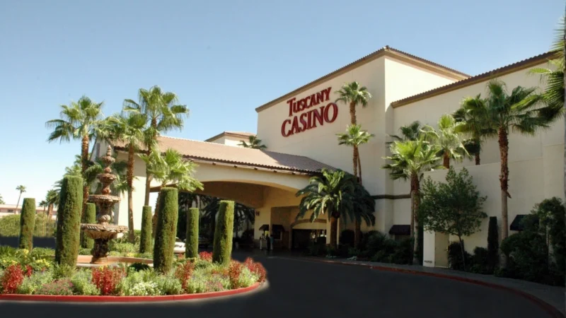 The beautiful, landscaped exterior facade of the Tuscany Suites & Casino resort.