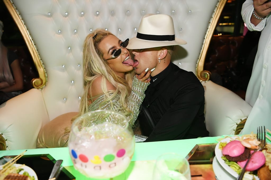 Jake Paul and Tana Mongeau get playful at the sweetheart table.