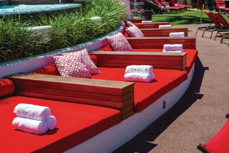 A sophisticated, cushioned daybed setup at Moorea Beach Club.