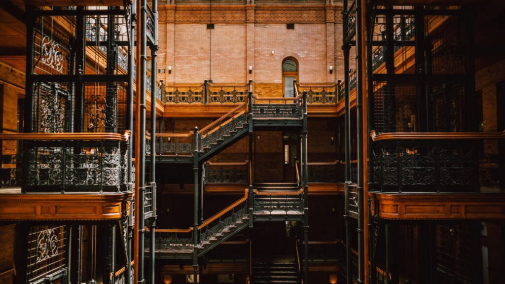 ornate wrought iron staircases inside the historic Bradbury Building