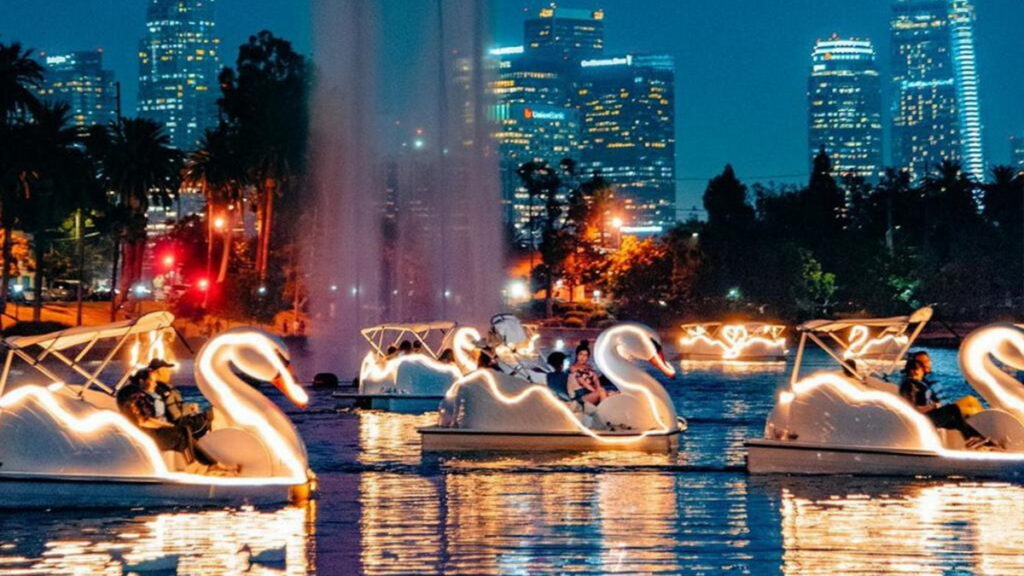swan paddle boats on Echo Park Lake with Downtown Los Angeles skyline