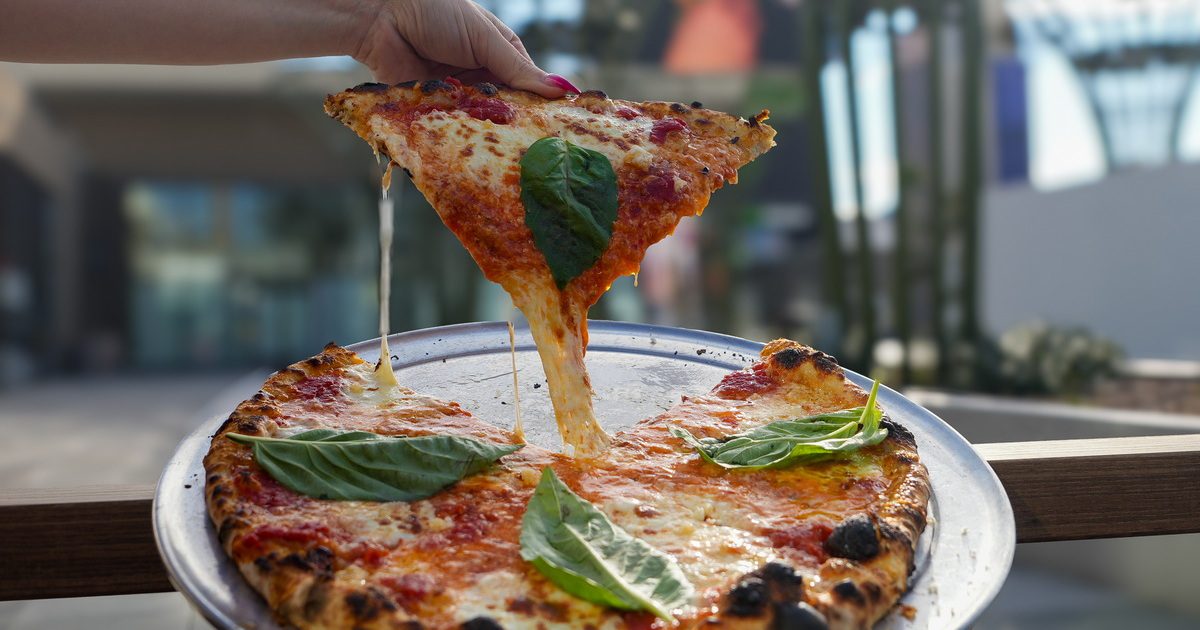 OG Pizza with cheese pull at How Ya Doughn