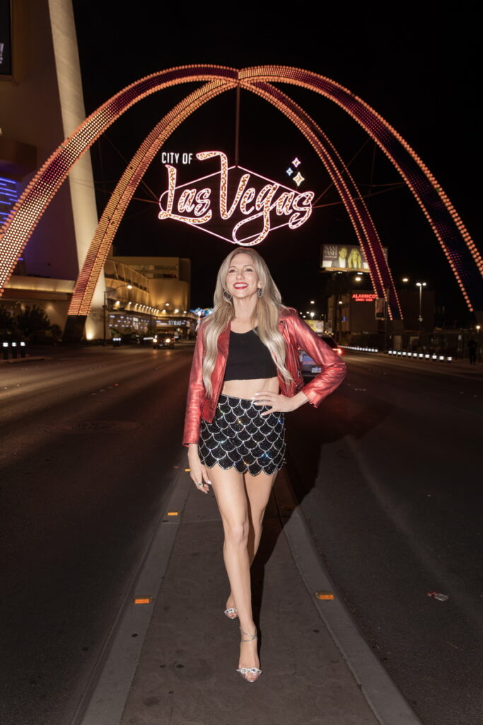 Debbie Gibson in front of the City of Las Vegas Sign